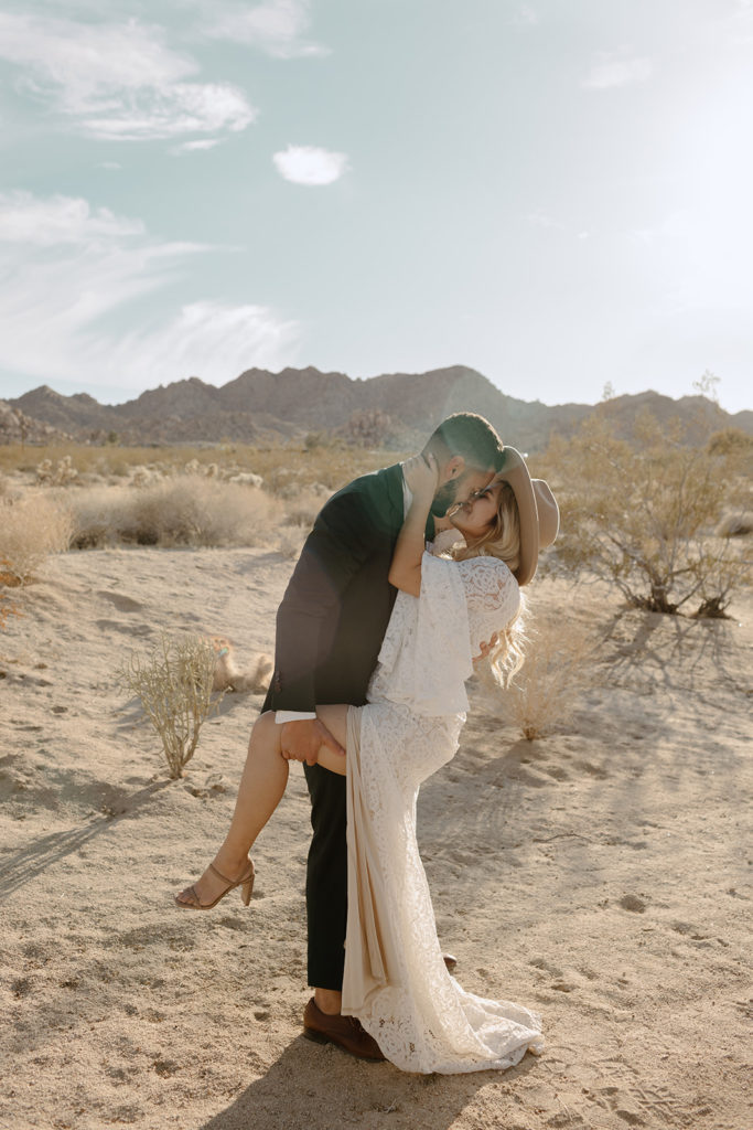 couple being playful at desert