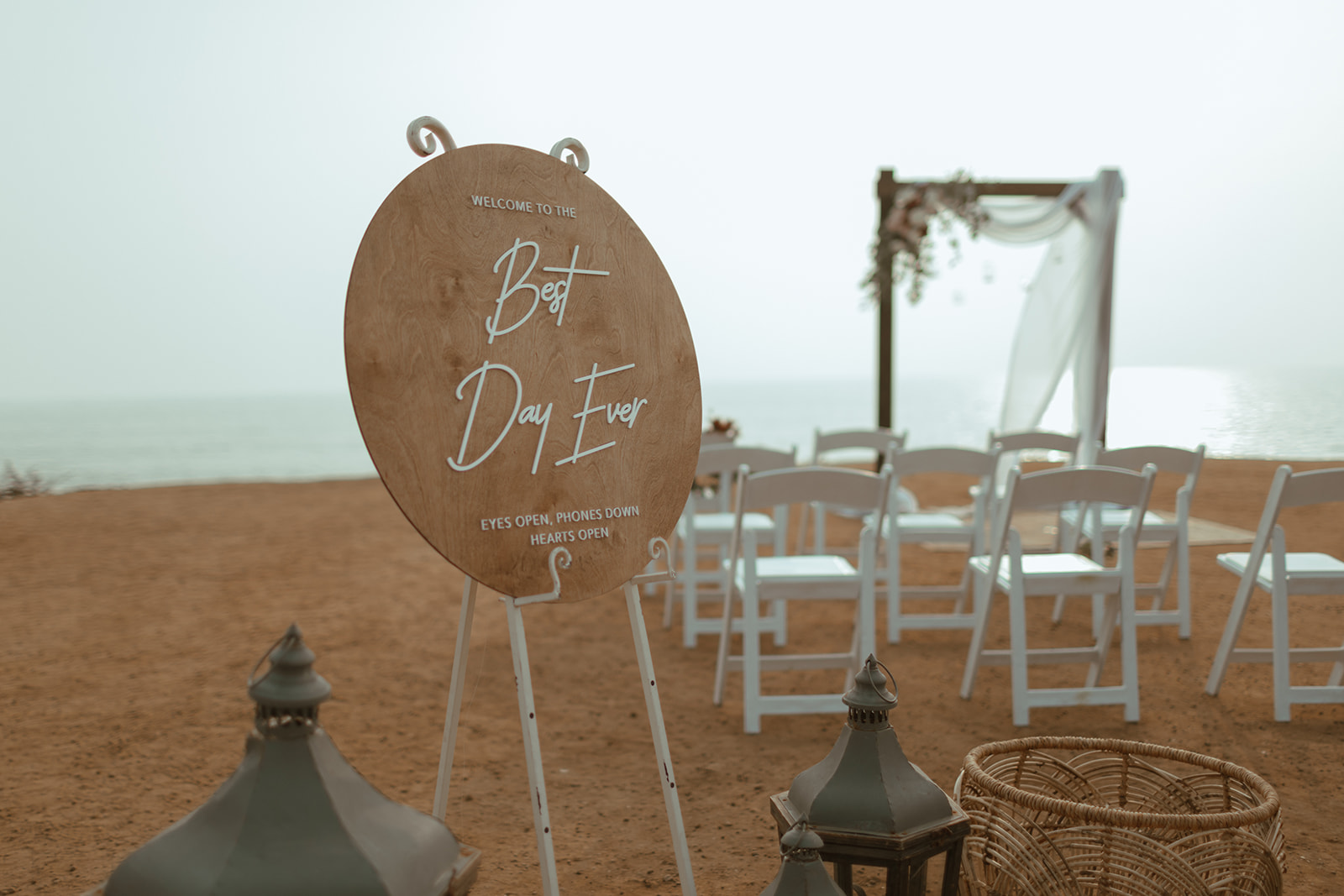 San Diego Elopement at Sunset Cliffs with wedding sign on cliff of beach