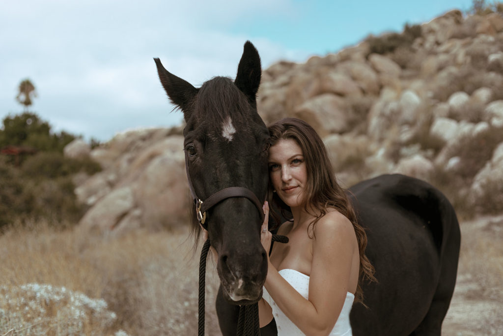 bride and groom with horse during styled photo shoots