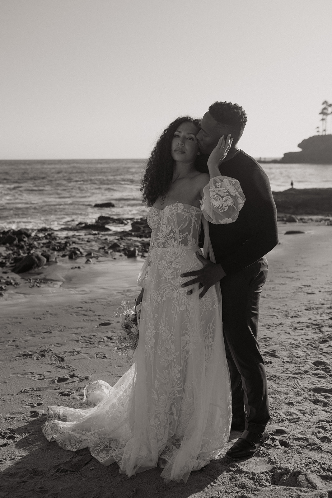 Southern California Beach Elopement at Laguna Beach with boho wedding dress in black and white